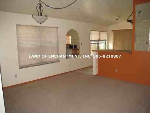 7743 San Benito St NW - Photo 3 of 22