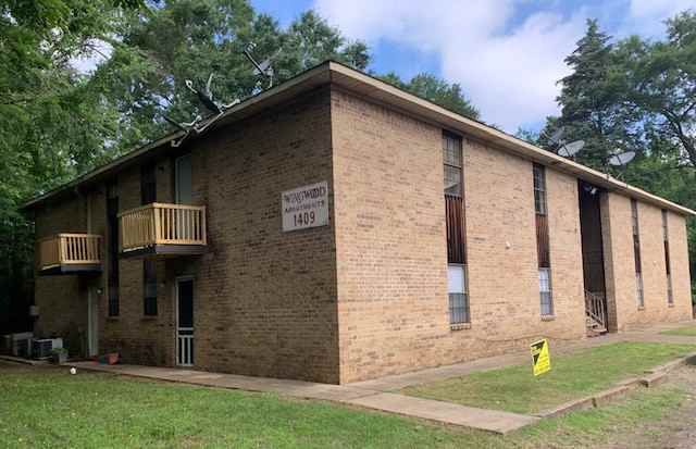 1409 Wingwood Apartments - Photo 2 of 9