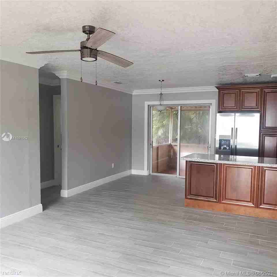 6901 Raleigh St - Photo 2 of 14