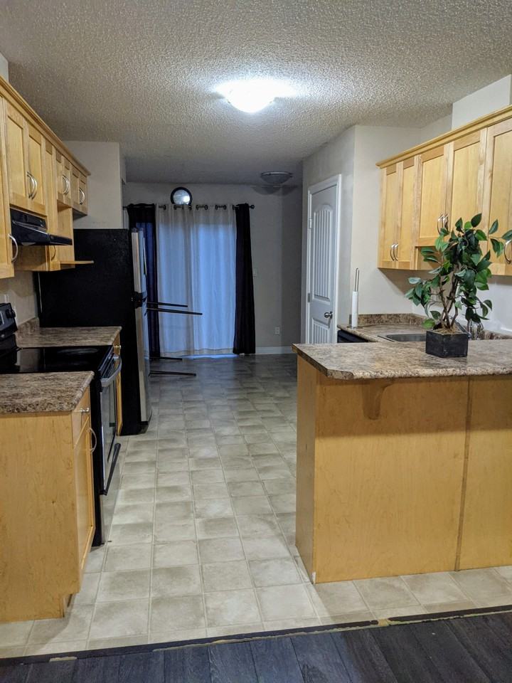 7003 130 Ave Nw #4 - Photo 2 of 19