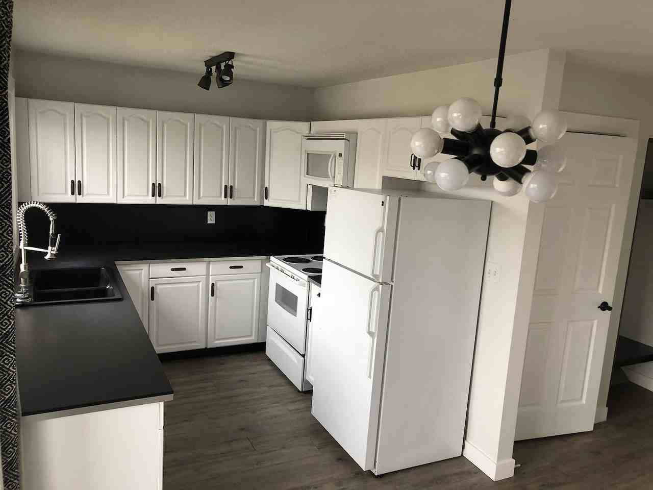 Bright & Spacious 3 Bed 1 Bath Split Level Townhouse!*1 Month Free*Deck - Photo 2 of 28
