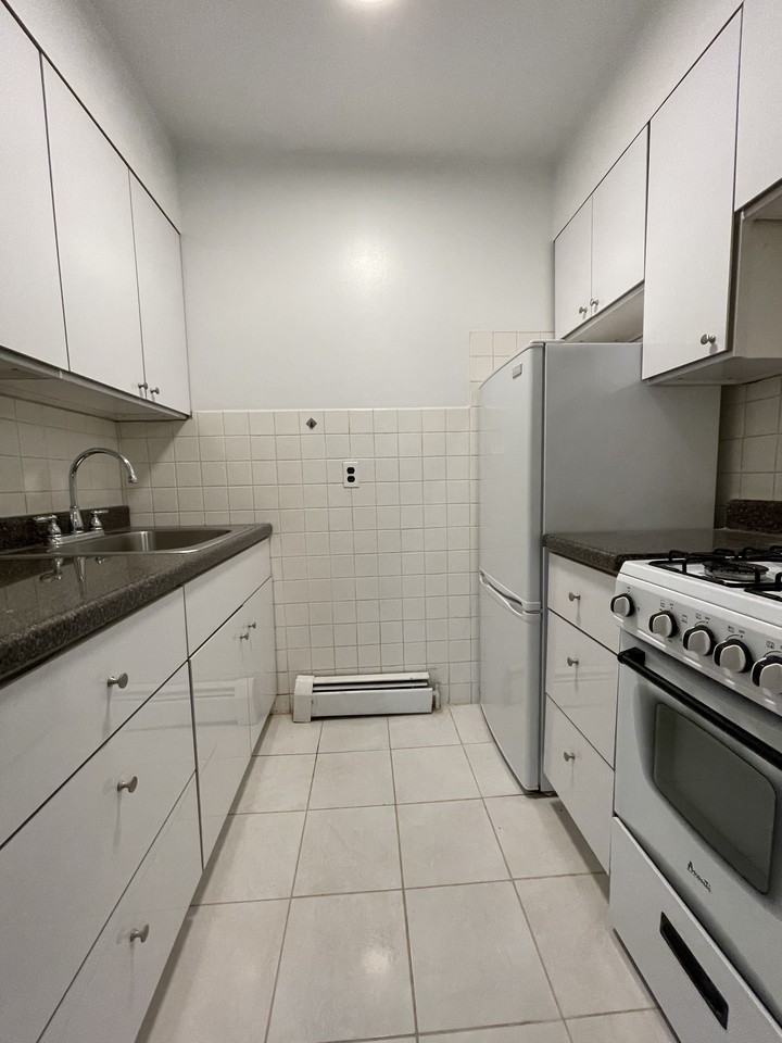 Santom Realty Corp. - Photo 3 of 9