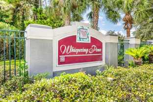 Whispering Pines Apartments - Photo 1 of 1