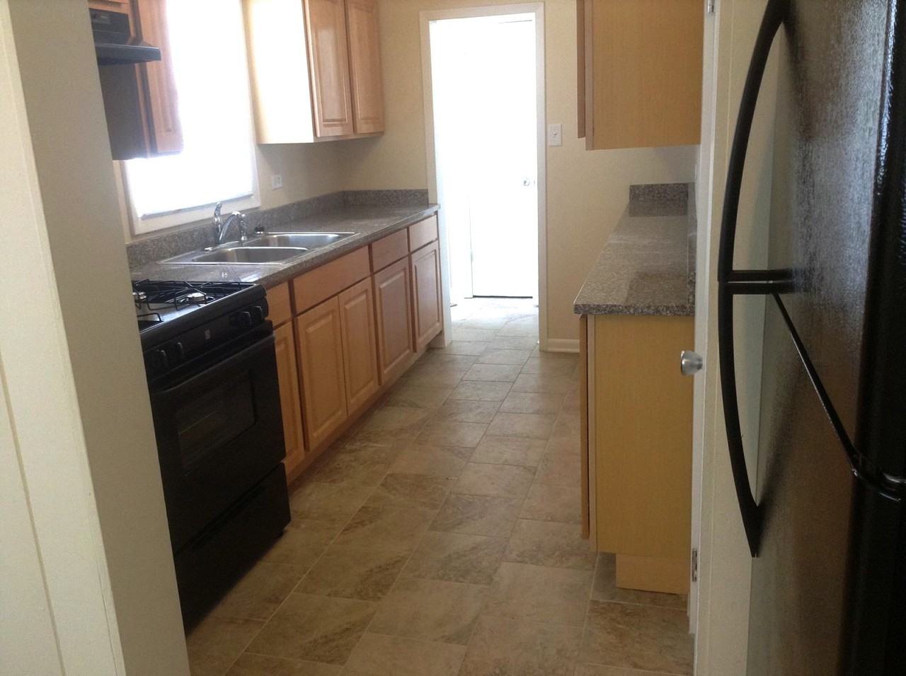 657 W Exchange St - Photo 2 of 14