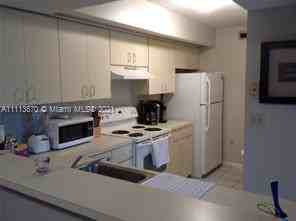 8680 Southwest 212th Street - Photo 2 of 4