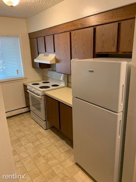 Village Apartments - Photo 3 of 6