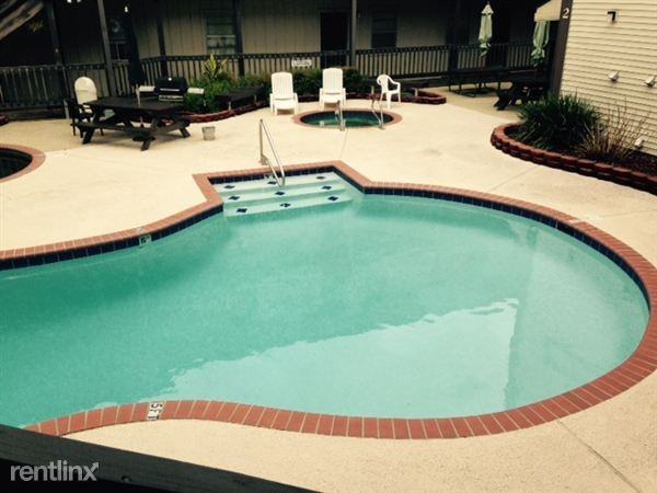 Riverwood Condominiums - Photo 3 of 4