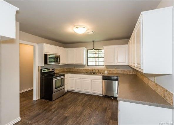 514 Se Greystone Ave - Photo 3 of 15