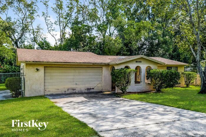 8645 Moss Haven Rd - Photo 2 of 15