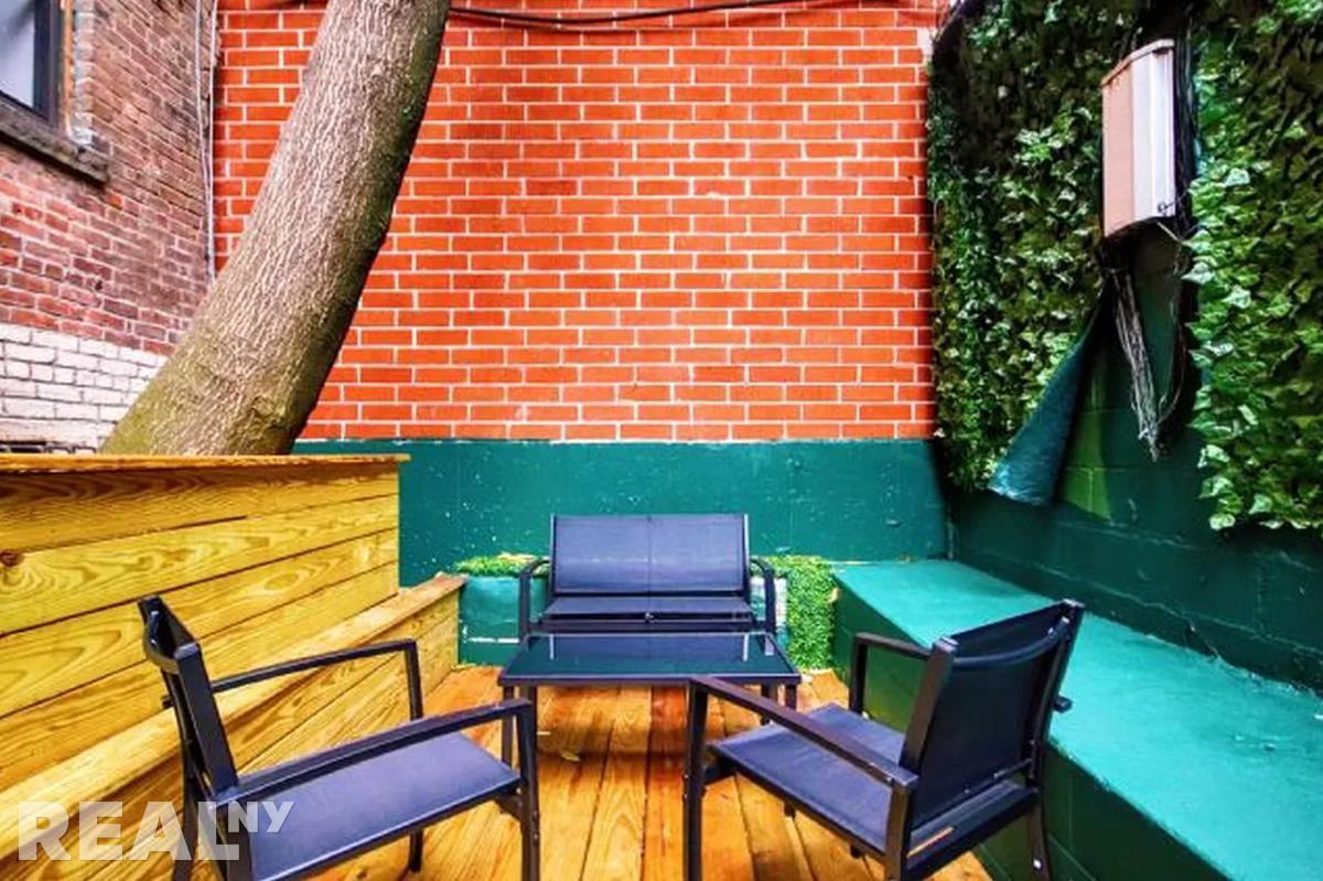 E 5th St #1 - Photo 2 of 8