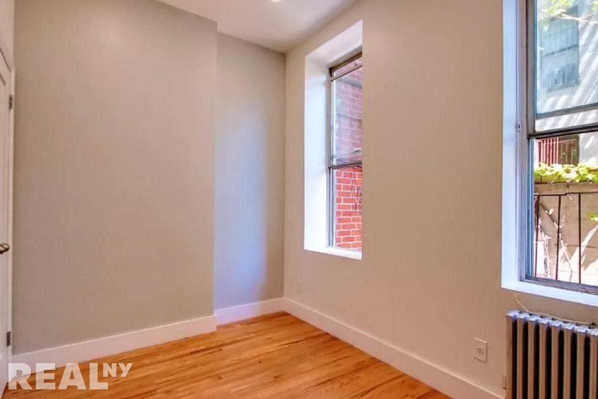 E 5th St #1 - Photo 4 of 8