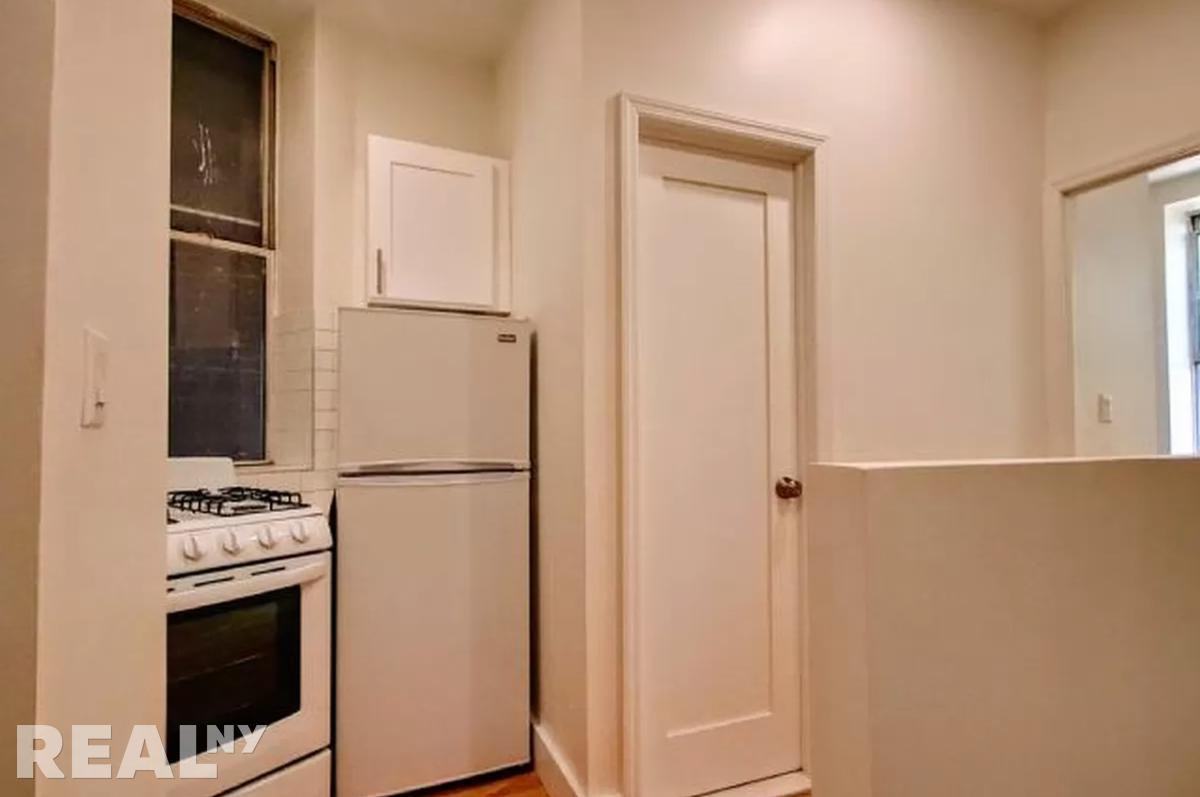 E 5th St #1 - Photo 5 of 8