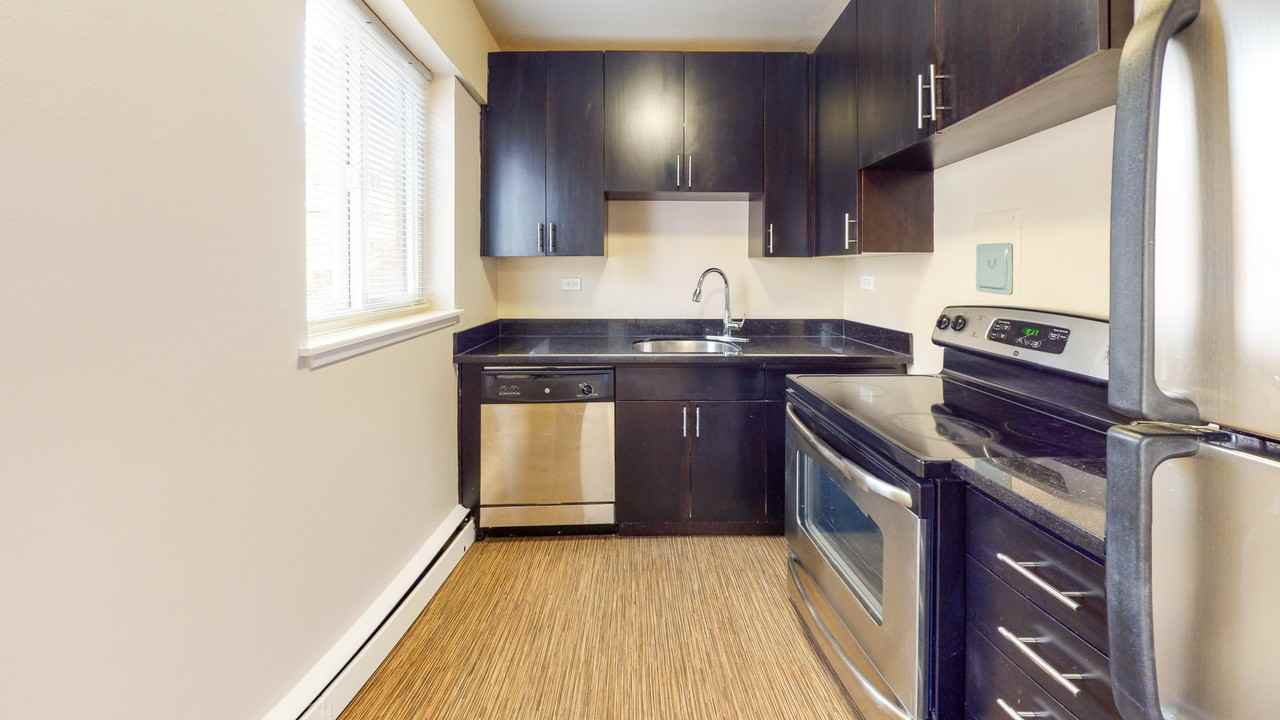 The Q Apartments - Photo 5 of 29