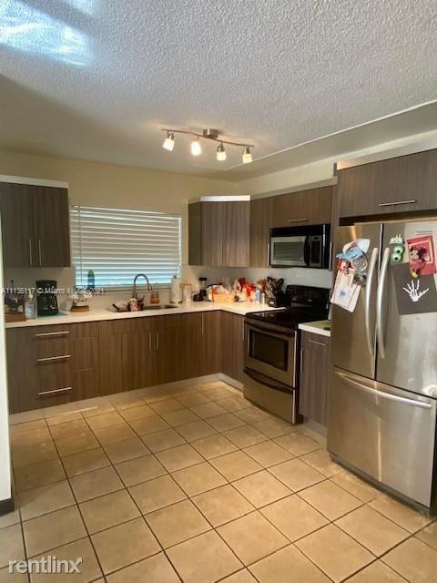 555 Nw 99th Pl #555 - Photo 3 of 10