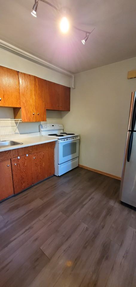 9718 84 Avenue Northwest front suit - Photo 3 of 21