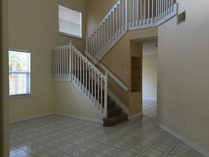 10981 NW 48th Terrace - Photo 3 of 7