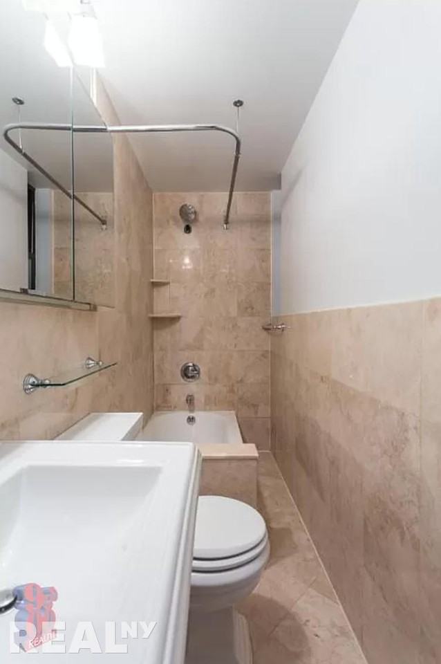 E 9th St #8 - Photo 3 of 3