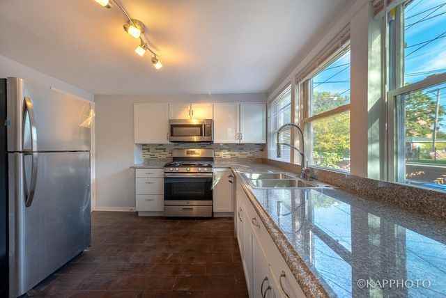 47 E 37th Pl - Photo 3 of 37