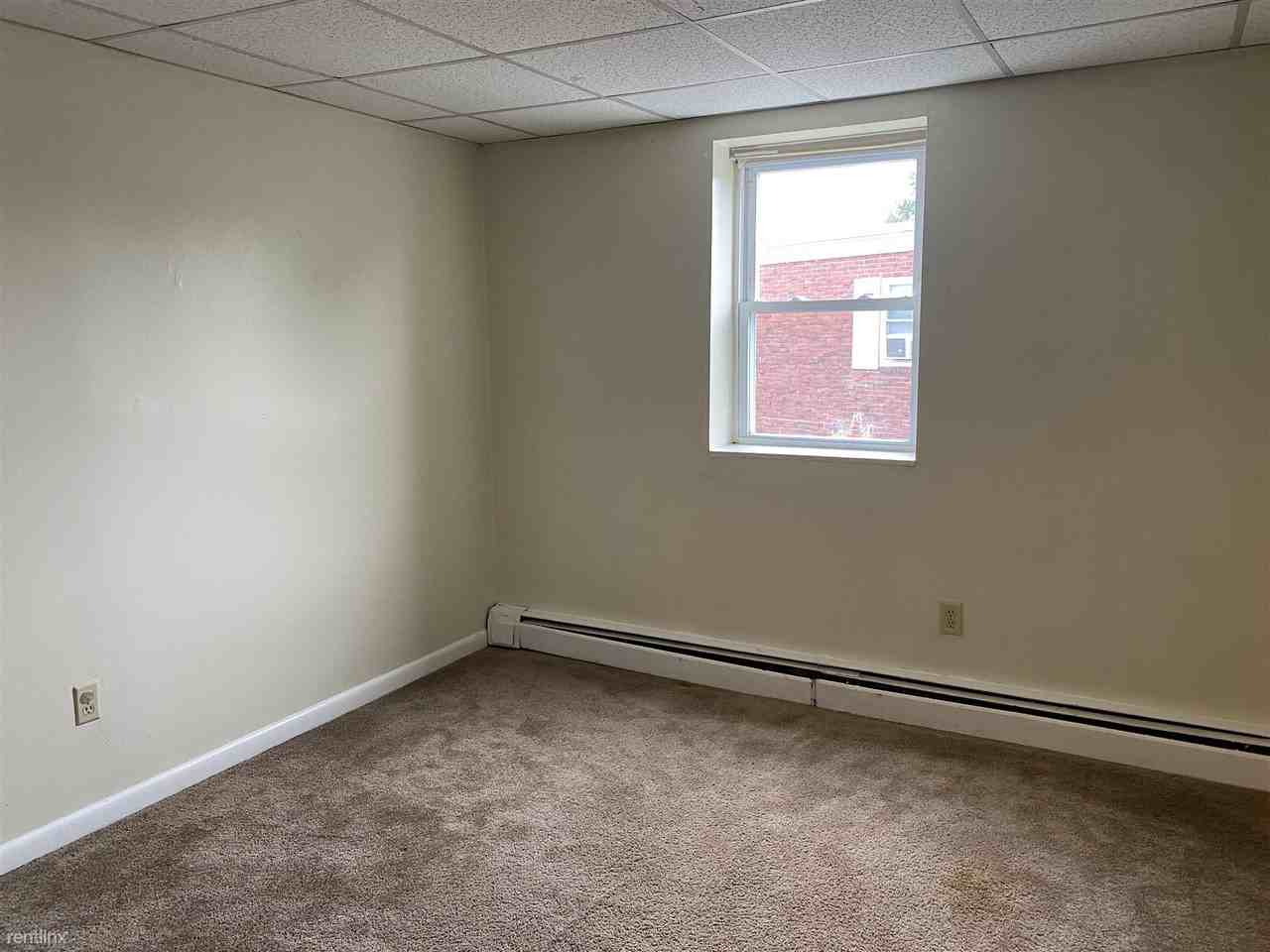 Highland Apartments - Photo 3 of 4
