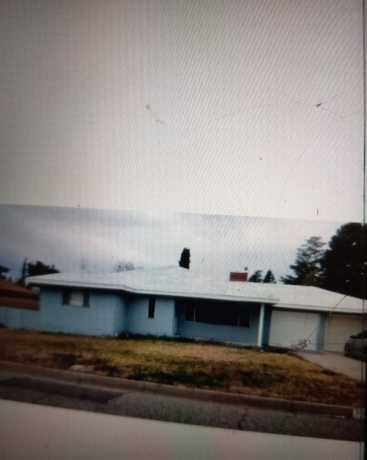 909 E 6th St - Photo 2 of 4