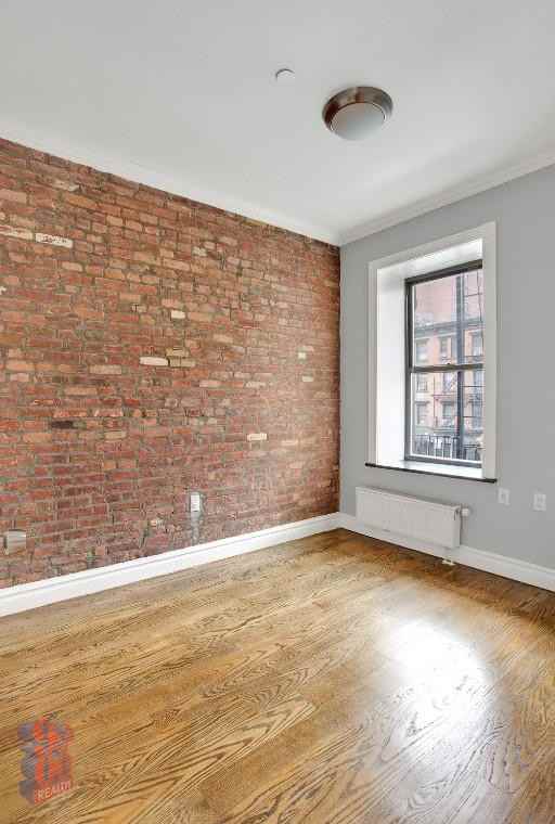 E 13th St #2A - Photo 3 of 6