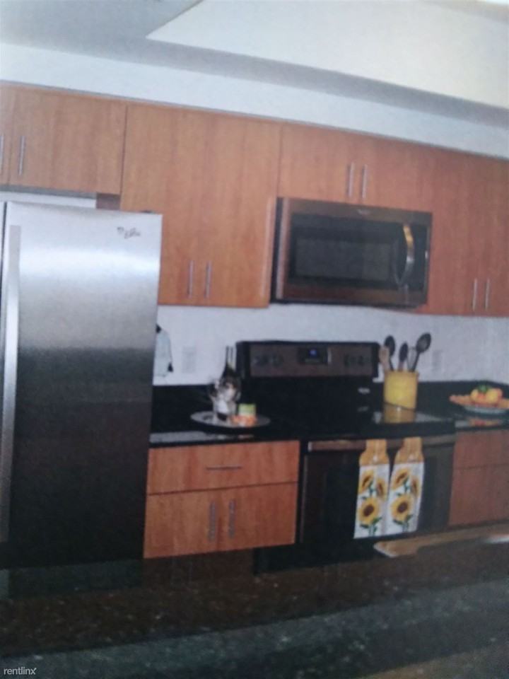 9357 SW 77th Ave - Photo 3 of 4