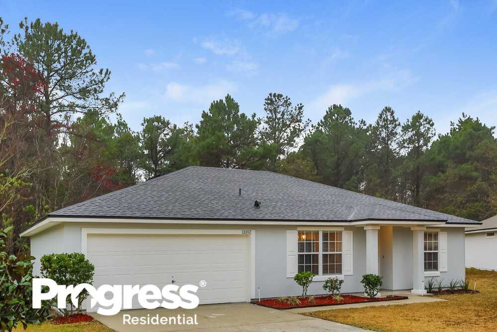 11102 Lauren Oak Ln S - Photo 2 of 16