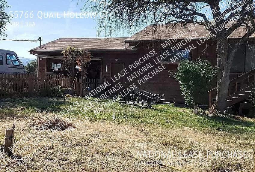 55766 Quail Hollow Ct - Photo 2 of 5