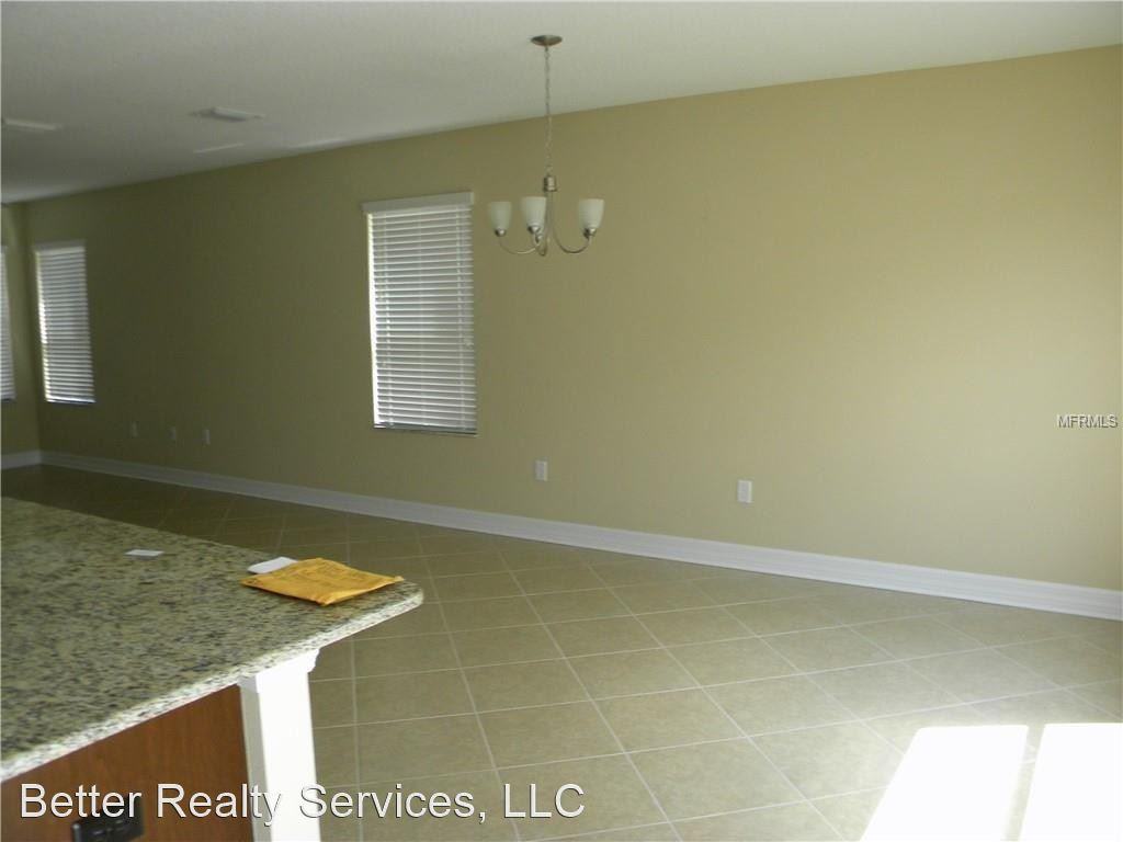 7810 Tuscany Woods Dr - Photo 3 of 14