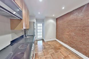 E 23rd St #002 - Photo 1 of 1