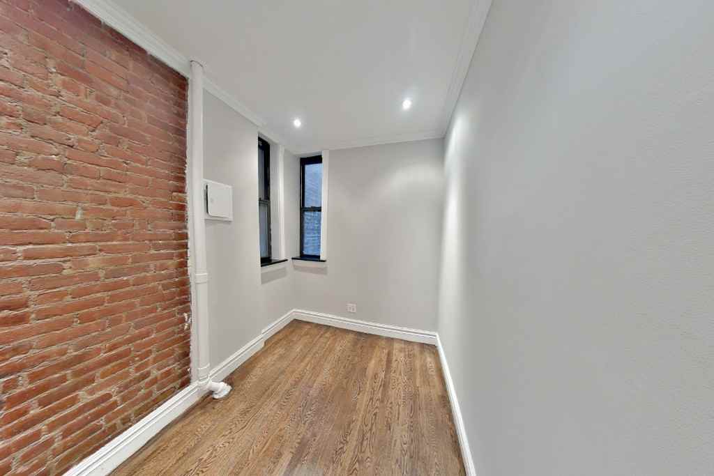 E 23rd St #002 - Photo 3 of 3