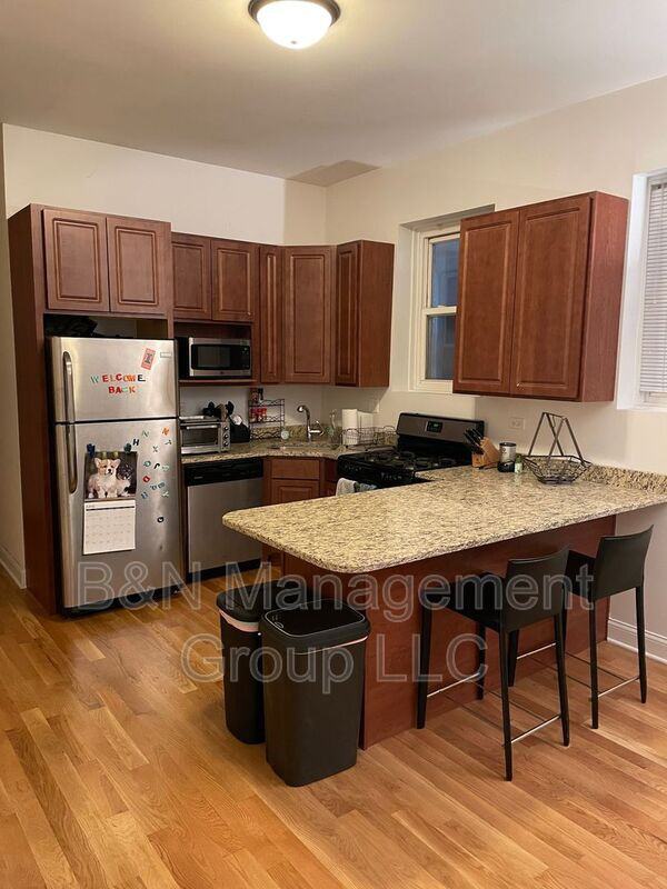 2337 N Janssen Ave #1F - Photo 2 of 8