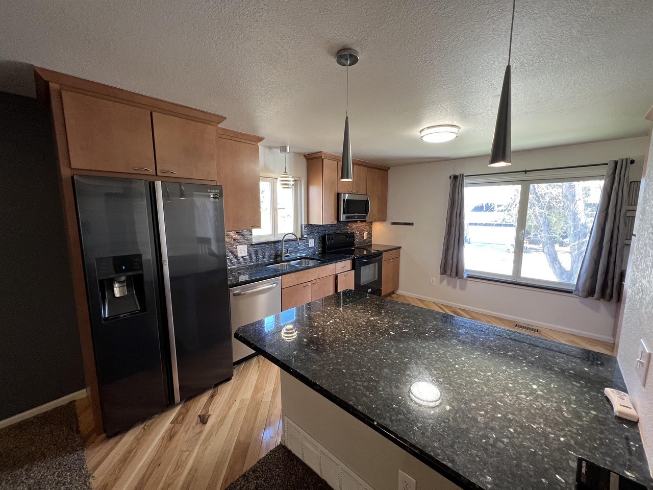 7667 S Ingalls St #1 - Photo 3 of 11