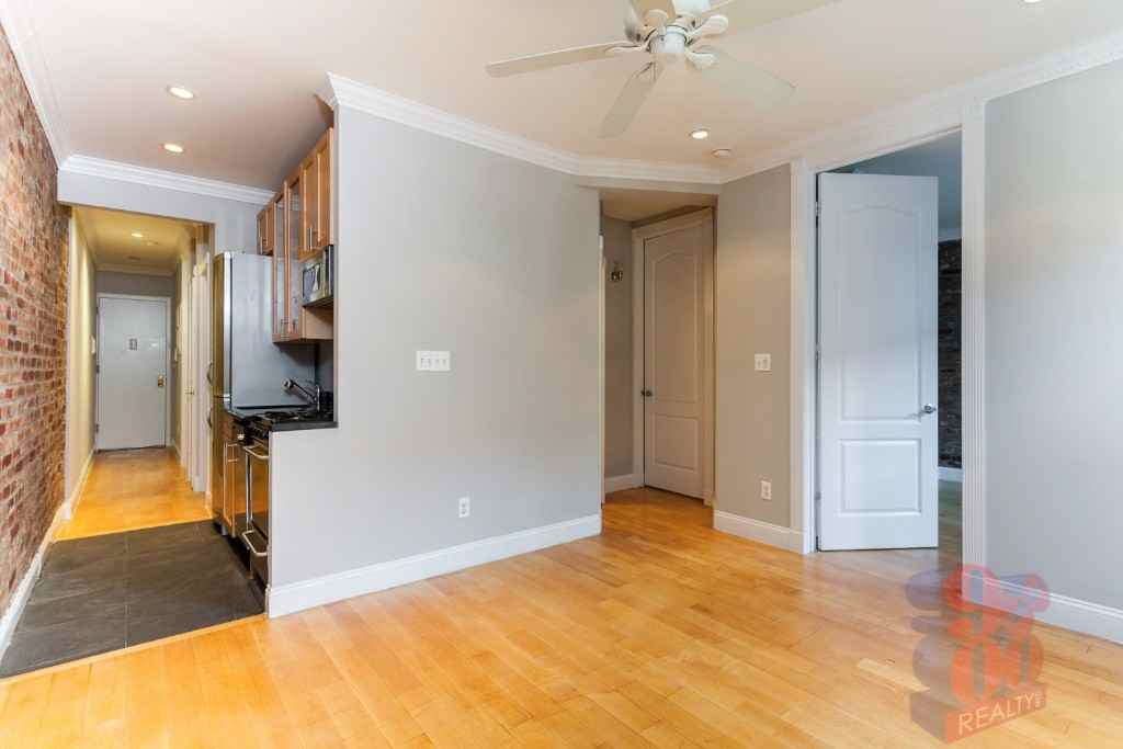 E 18th St #1A - Photo 2 of 8