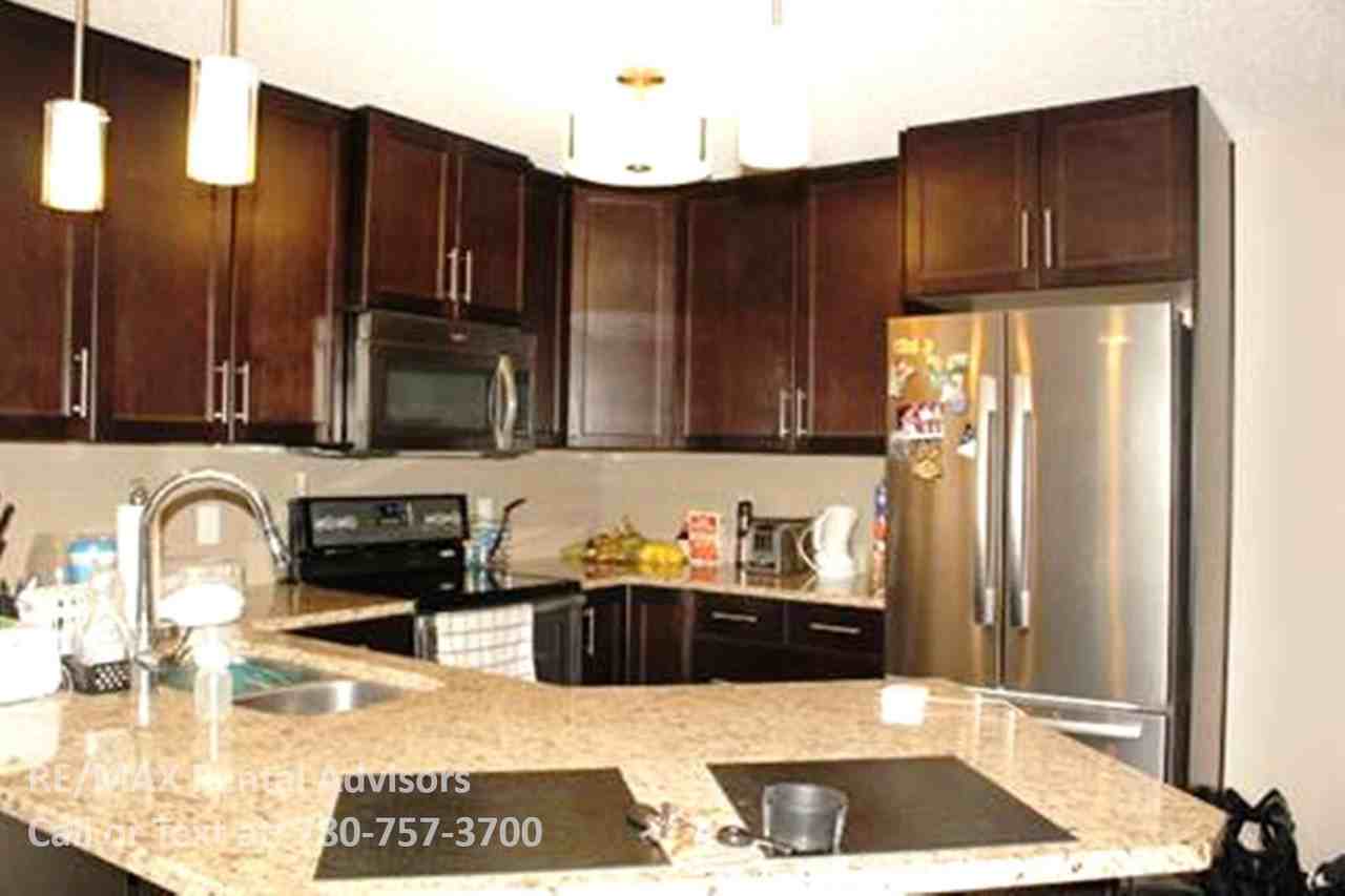 2203 44 Ave Nw - Photo 2 of 7