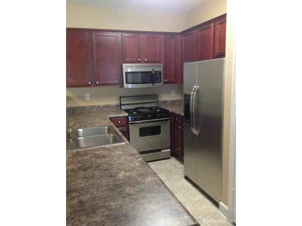 Centennial Village Apartments - Photo 2 of 19