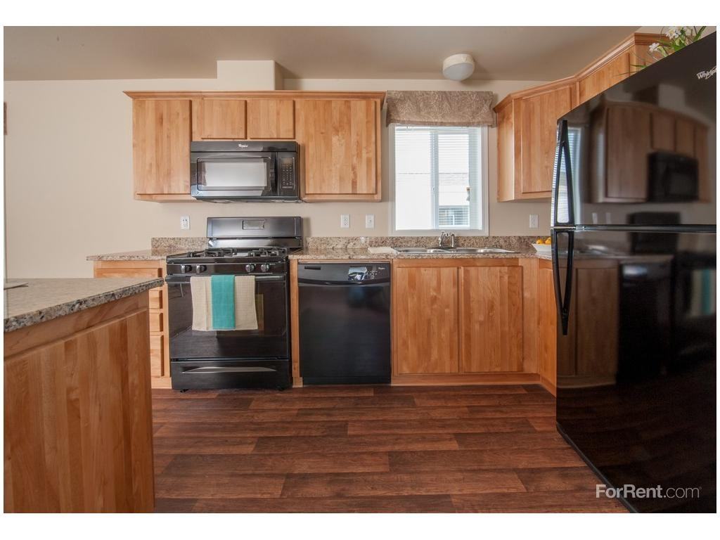 Four Seasons Apartments - Photo 2 of 2