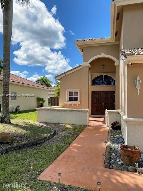 19102 Nw 23rd Ct - Photo 2 of 20