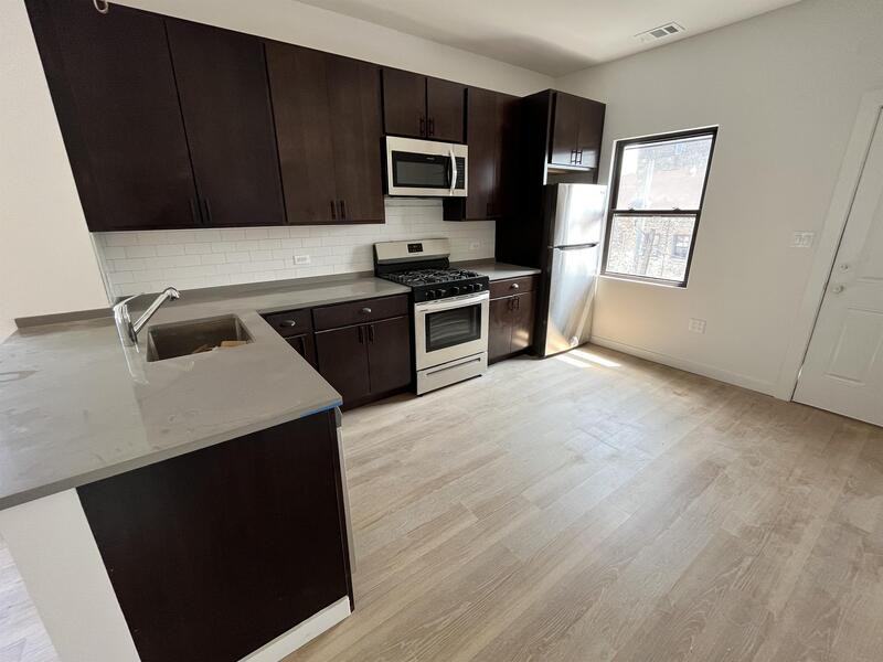 1005 W 32nd St - Photo 7 of 25