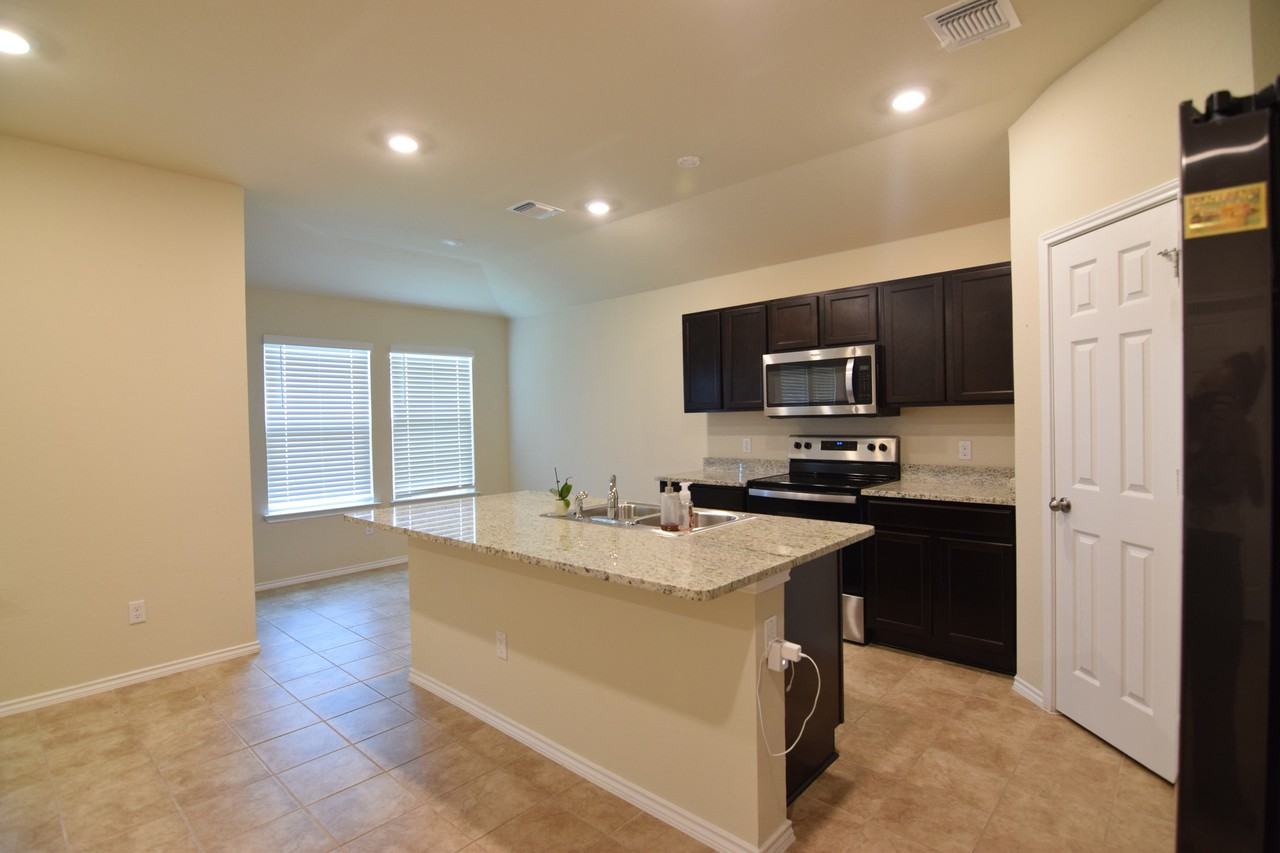 5912 Sally Ride Ln - Photo 6 of 20
