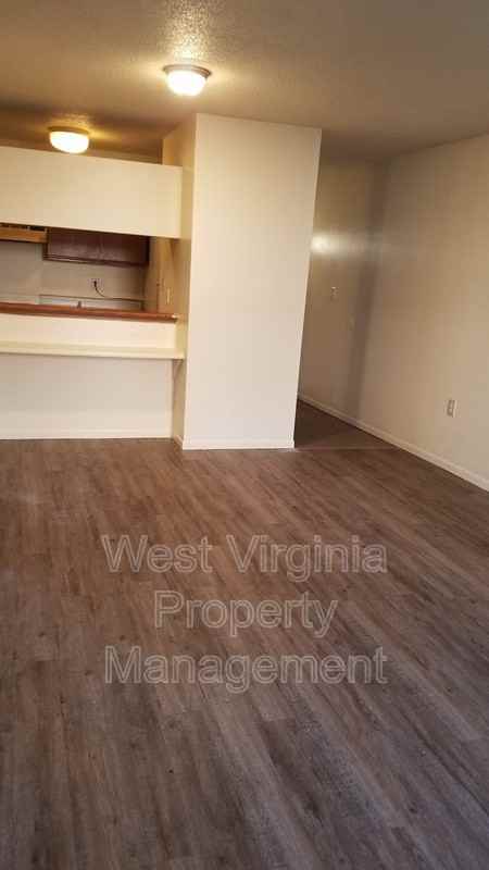 200 W Main St #103 - Photo 2 of 8
