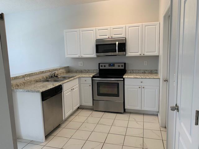 1803 Royal Ridge Dr #1 - Photo 5 of 27