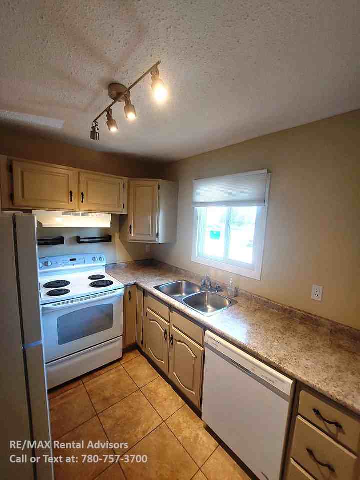 3328 116a Ave Nw - Photo 3 of 17