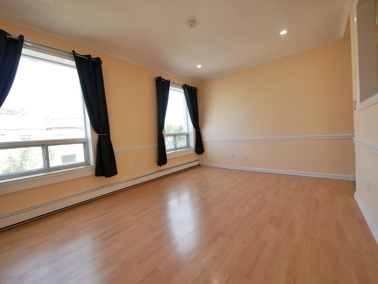 1383 Queen St E #206