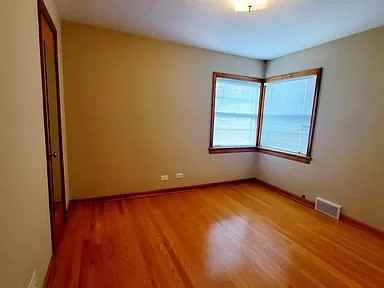 705 Oakton St - Photo 2 of 17