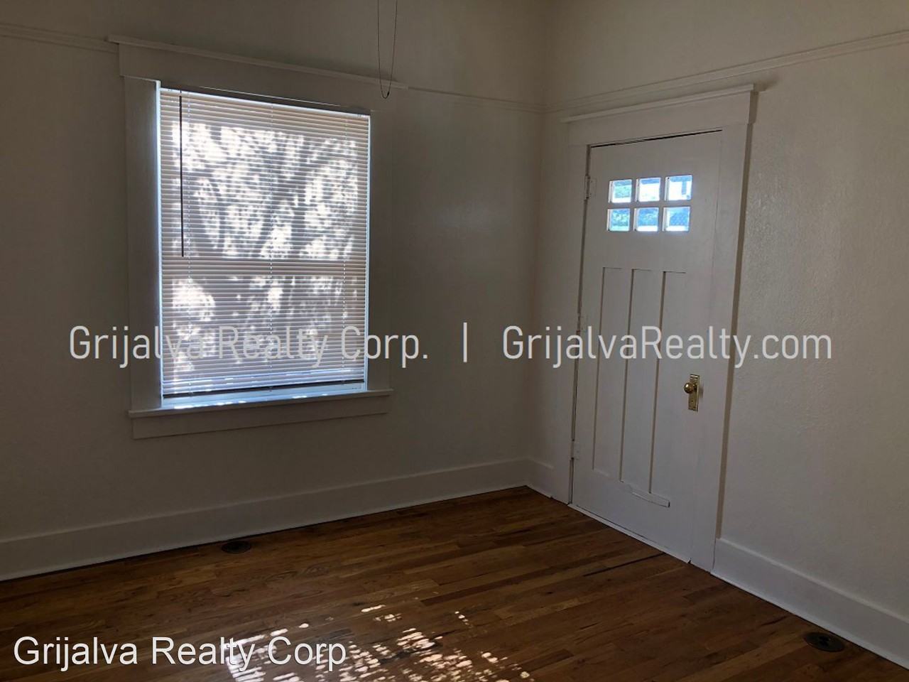 203 E 2nd St - Photo 2 of 10