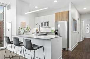 featured image of 313 W Wolf Point Plz #3-2