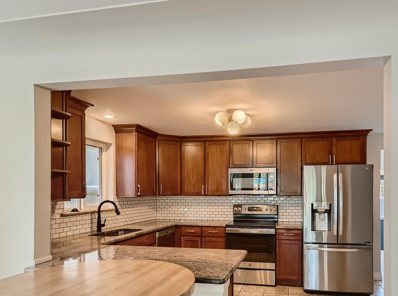 Updated Sunnyside gem with grassy fenced yard & patio - Photo 6 of 20