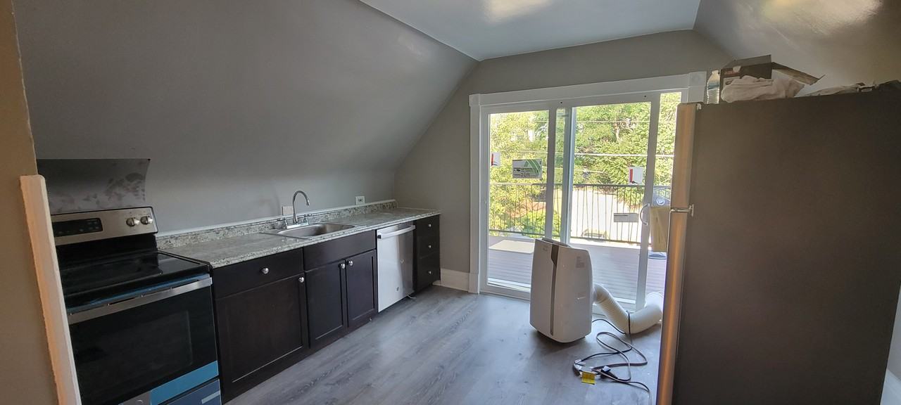 1042 N Clarkson St - Photo 2 of 11