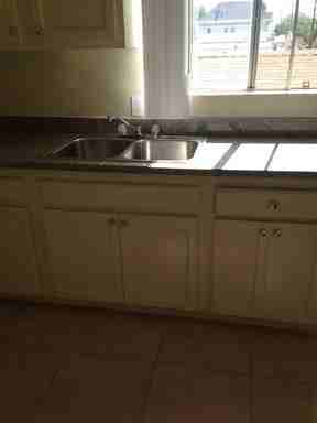 1447 W 54th St #D - Photo 3 of 16